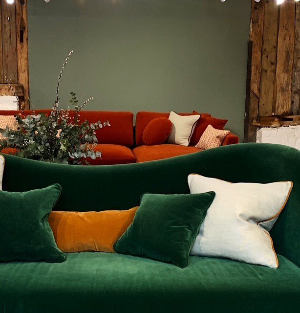 Showroom redesign and interior styling featuring curated home décor and visual merchandising for Love Your Home in Surrey. Styled showroom vignette with layered textiles, furniture and accessories for Love Your Home interior redesign in Surrey.