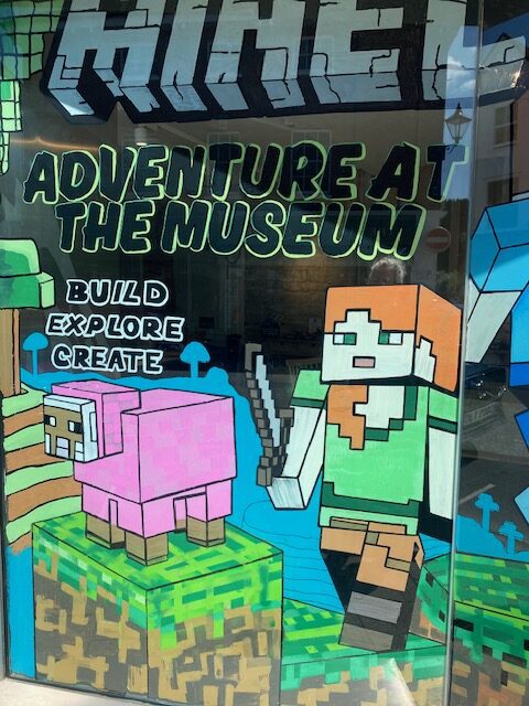 Branded event artwork designed to support museum marketing communications. Minecraft event