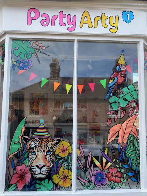 Brand identity window and signage design and paint surrey 