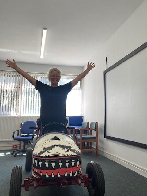 Bold shark‑themed artwork supporting a community charity event.